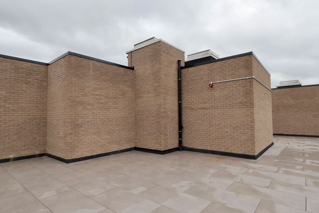 Paved roof terrace